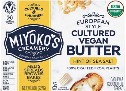 picture of miyokos butter in its white navy blue and yellow paper packaging